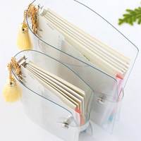 Fabricant en gros classeur à feuilles mobiles en PVC souple transparent de taille A6 avec couverture à 6 anneaux et bouton pression de style spirale