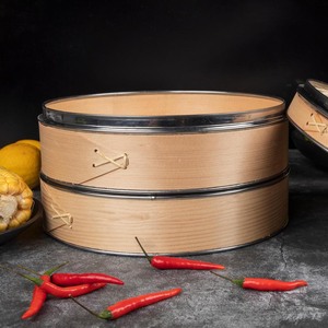 Vaporera de madera con anillo de acero inoxidable y cesta de bambú para cocinar dumplings, bao buns, dim sum, rice potstickers y comida asiática al vapor. - Product Image 1