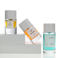 Fabrication de flacons de parfum en verre cylindriques personnalisés de luxe 30ml 50ml 100ml avec couvercle blanc