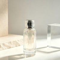 Vente en gros d'usine - Flacons de parfum en verre luxueux et élégants de 50 ml et 100 ml, forme cylindrique, flacon de parfum vide et boîte