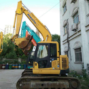 Komatsu 128US รถขุดมือสองพร้อมปั๊มเครื่องยนต์แกนดรัมขนาดใหญ่ตรวจสอบอย่างเต็มที่ - Product Image 1