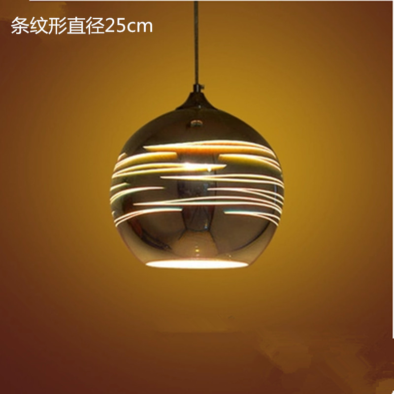 Bola redonda rayada de 25 cm de diámetro.