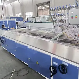 Extrudeuse conique à double vis à profil UPVC pour panneau de porte en plastique et ligne d'extrusion de fenêtres pour la maison et le commerce