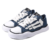 Chaussures en toile tendance à semelle effet fondu pour hommes et femmes, baskets épaisses à motif imprimé os, chaussures de couple rétro vintage pour le marché européen