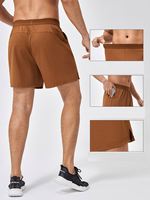 Vêtements de sport pour hommes respirants à séchage rapide en tissu tricoté uni avec transfert par sublimation extensible pour l'entraînement, la course et le sport