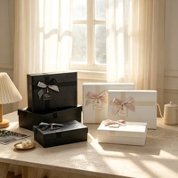 Boîte rectangulaire de luxe en papier artistique avec motif de rose en relief, boîte haut de gamme, 3 pièces, boîte cadeau cosmétique avec ruban et nœud, emballage cadeau
