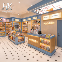 Comptoir d'exposition incurvé lumineux à LED, personnalisable (bleu/jaune), éco-responsable, avec dessus en bois et étagères pour magasin de jouets pour enfants