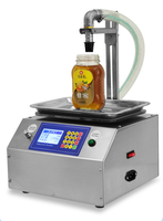 Remplisseur de pesage semi-automatique Échelle de sauce au miel Machine de remplissage de liquide oral Machine de remplissage de table