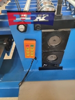 Machine à fabriquer des tôle ondulée pour toiture