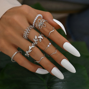 Fashionable and unique hollowed-out flower <b>stacked</b> <b>ring</b> set, smooth leaf and vine imitation pearl joint <b>rings</b>, 10-piece set. - Product Image 1
