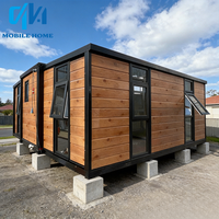 Maison conteneur préfabriquée de luxe moderne en acier de 20/30/40 pieds, extensible avec salle de bain et cuisine, idéale pour les villas