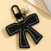 Porte-clés en cuir PU avec nœud pour décorations de fête Coquette, pendentif élégant en forme de nœud, cadeaux pour la salle de classe et usage quotidien