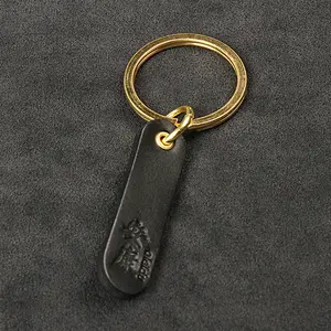Брелок для ключей из воловьей кожи головы с латунным кольцом для ключей Автомобильный брелок из натуральной кожи с пользовательским логотипом
