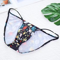 Slips string pour homme en nylon tricoté à motif crâne, avec effet push-up fessier, respirants, sculptants, taille basse et poche frontale large