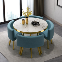Ensemble de table à manger ronde moderne, luxueuse, durable, imperméable et écologique avec chaises en métal pour une utilisation en extérieur dans les hôtels, 1 table et 4 chaises