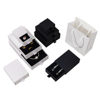 Boîte d'emballage de bijoux rectangulaire de qualité professionnelle, style tiroir, avec doublure en éponge, noir et blanc, organisateur multi-tailles pour boucles d'oreilles