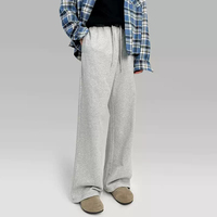 Pantalon de survêtement vintage personnalisé OEM/ODM, coupe ample, avec cordon élastique et ceinture à ourlet visible, effet délavé
