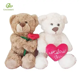 Greenmart - Novo urso de pelúcia adorável com flor, boneco de pelúcia Kawaii para meninas, presente perfeito para abraços e conforto