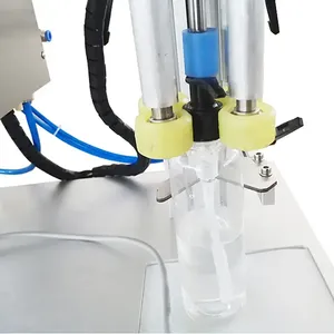 Máquina taponadora giratoria Máquina taponadora cosmética neumática Máquina taponadora de cabezal de bomba manual de escritorio pequeña - Product Image 3