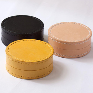 Caja de almacenamiento para auriculares a prueba de polvo, estuche redondo de cuero para auriculares, caja para auriculares, resistente a la presión y a los golpes. - Product Image 2