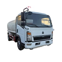 Camion-citerne à eau diesel d'occasion Sinotruk Howo de 10 000 litres en aluminium/acier au carbone, camion-citerne arroseuse 4x2 à vendre