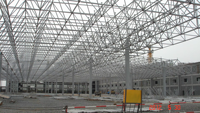 Entrepôt à structure métallique de style industriel moderne pour centres commerciaux – Bâtiment commercial à grande portée personnalisé – Forte demande en croissance