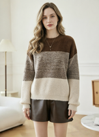 Pull en tricot colorblock confortable - Coupe ample et décontractée, texture douce et rayures tendance pour un look chic automne/hiver.