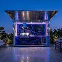 Innovadora Estación de Cocina Modular para Exteriores con Cubierta Abatible Motorizada, Acero Inoxidable, Moderna, Resistente a la Intemperie, para Patio o Sala de Estar
