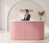 Comptoir de réception rose cannelé avec base LED, mobilier de salon pour institut de beauté