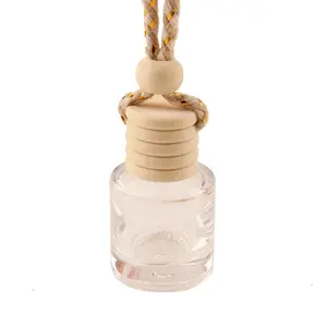 Wholesale Wood Hanging Car Aroma Diffuser 4.8 6.5ml 8ml air freshener cylinder frosted car hanging perfume bottle with wood cap