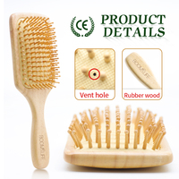 Brosse à cheveux ovale en bois avec coussin d'air, personnalisable avec logo, pour femmes et hommes, vente en gros OEM ODM sous marque privée