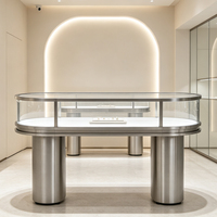 Vitrines en acier inoxydable modernes et personnalisées, d'inspiration luxueuse, adaptées aux montres et aux présentoirs de bijoux haut de gamme