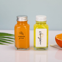 2 onces Petite bouteille en verre Ginger Shot 60ml Bouteille de jus de fruit carrée transparente avec couvercle hermétique en plastique et aluminium Logo personnalisé