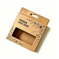 Boîte d'emballage suspendue en papier kraft durable, personnalisée avec fenêtre découpée en PVC transparent pour la commercialisation d'accessoires électroniques grand public