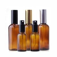 Leere 1oz 30ml 50ml Bernsteinfarbene Glas-Kosmetikflasche mit Gold-Silber-Lotionpumpe für Hautpflege Individuelles Logo OEM ODM