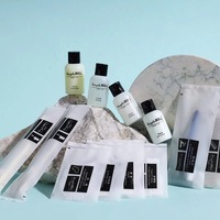 Fournitures d'hôtel Pantoufles de café Equipement Kit d'hygiène Savon Spa Set Pantoufles en Gris Articles de toilette jetables pour hommes Shampooing Bienvenue