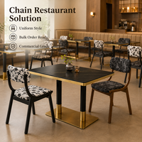 Ensemble table et chaises de restaurant en pierre noire avec chaises en tissu imprimé floral, en vente pour café, traiteur et maison d'hôtes