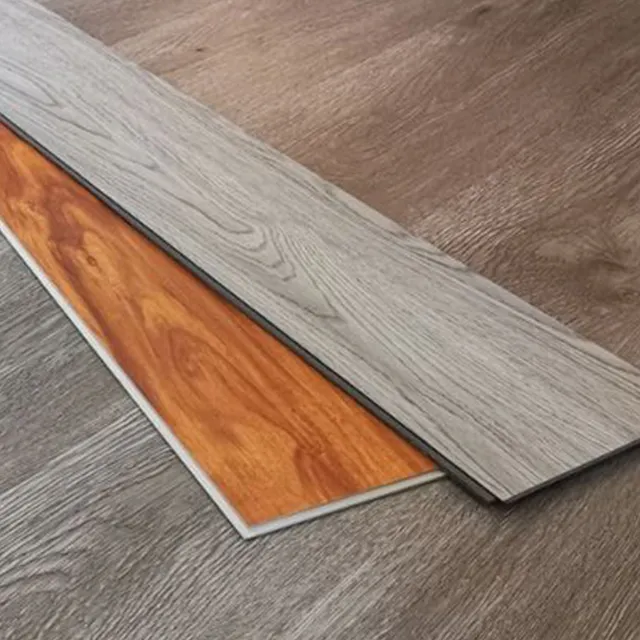 Plancher en plastique spc à chevrons usine expédition directe revêtement de sol en pvc résistant à l'usure 9000 tr/min pour les endroits avec beaucoup de gens