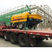 Pompe à béton sur remorque, moteur à essence facile d'entretien, pour le transfert de béton dans les structures secondaires de grande hauteur