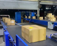 Convoyeur à bande télescopique pour le transport de colis et de cartons en station express pour la logistique