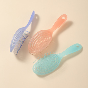 Nuevo masaje Color Costillas huecas Malla de ventilación Mssage Secado y cabello suave húmedo Aguja de nailon antinudos Cepillo para el cabello Airbag Peine - Product Image 1