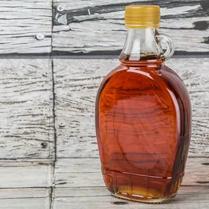 Đặc biệt Maple Leaf hình dạng tùy chỉnh thủy tinh dầu ô liu chai cao cấp sản xuất cho gia vị nước tương số lượng lớn marasca chai rượu vang