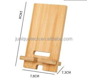 Soporte para teléfono móvil <span class=keywords><strong>de</strong></span> madera Flexible impermeable <span class=keywords><strong>de</strong></span> bambú natural, inserto <span class=keywords><strong>de</strong></span> cama <span class=keywords><strong>de</strong></span> escritorio <span class=keywords><strong>con</strong></span> orificio para teléfono y tableta - Product Image 1