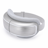 Masque de massage oculaire sans fil haut de gamme OEM ODM avec compression d'air, compresse chaude, vibration, musique, pliable et rechargeable