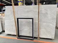 Chine Marbre en bois blanc en finition mate Carreaux incurvés en marbre en bois blanc pour carreaux de revêtement de façade de mur extérieur