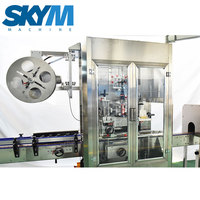 Machine d'étiquetage automatique à manchon rétractable SKYM pour bouteilles d'eau minérale et de boissons