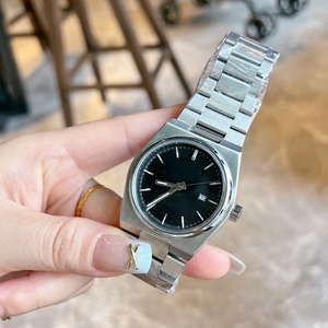 Montre haut de gamme pour homme avec cadran bleu - une montre automatique de luxe dotée d'un boîtier tonneau en acier inoxydable. - Product Image 2