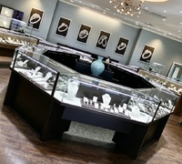 Îlot de présentation de bijoux de luxe en forme d'anneau octogonal, vitrine en verre haut de gamme pour les bijouteries haut de gamme