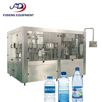 Machine de remplissage d'eau potable en bouteille entièrement automatique
