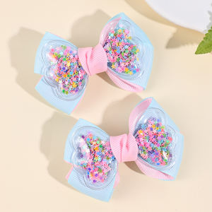 CN ริบบิ้นผ้ากรอสเกรน2ชิ้นโบว์ติดผมสีพาส<span class=keywords><strong>เท</strong></span><span class=keywords><strong>ล</strong></span>โบว์สีทึบพร้อมกลิตเตอร์ค<span class=keywords><strong>ล</strong></span>ิปหนีบ<span class=keywords><strong>ผม</strong></span>เด็กผู้หญิง - Product Image 1